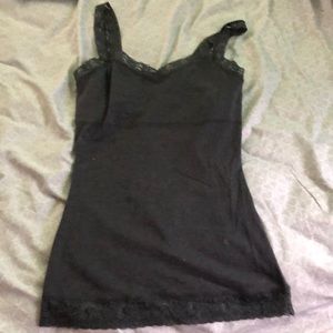 This is a lace tank top shirt with a bra in it.